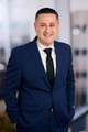 Headshot of Harry Kapukchyan